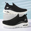 TigleX FreeStep Schuh in Schwarz mit weißer Sohle – ergonomischer Slip-On mit atmungsaktivem Obermaterial und starker Fußgewölbeunterstützung
